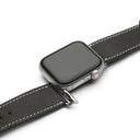 Smartwatch with a black leather strap on a white background