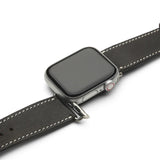 Smartwatch with a black leather strap on a white background