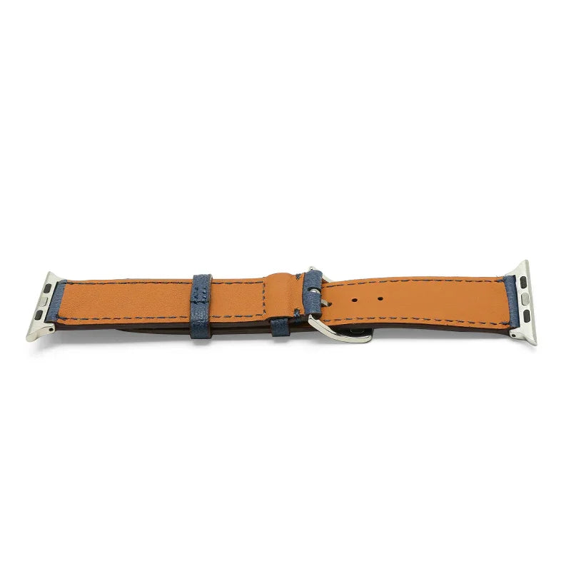 Tan lining leather watch strap with silver hardware on a white background