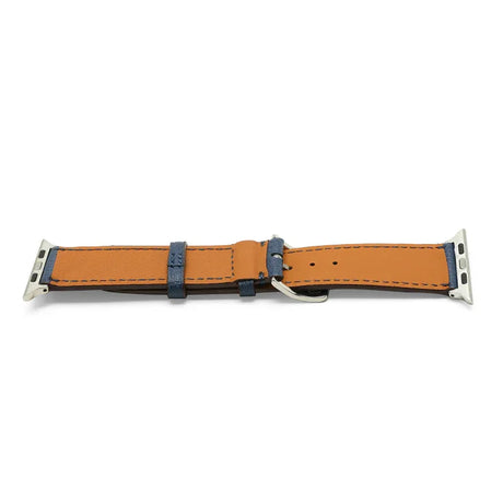 Tan lining leather watch strap with silver hardware on a white background