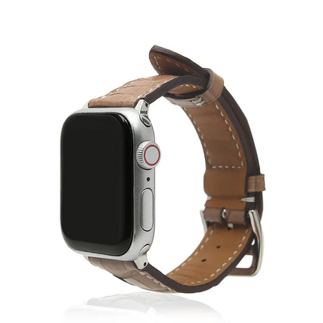 Poussier genuine crocodile skinw watch strap on a white background