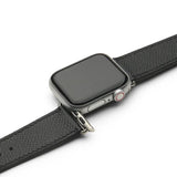 Smartwatch with a black leather strap on a white background