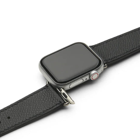 Smartwatch with a black leather strap on a white background