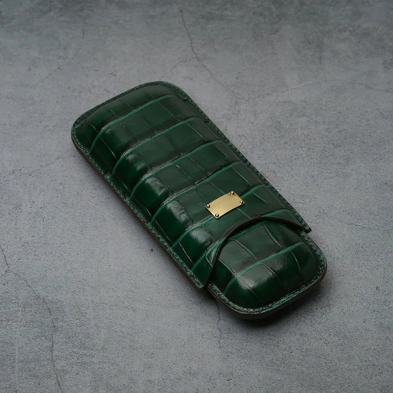 Green crocodile-textured leather cigar case with gold plaque, luxury travel accessory
