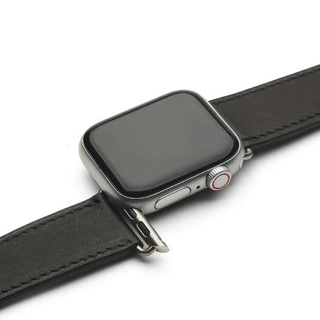 Smartwatch with a black leather strap on a white background