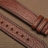 Macro texture of Italian Ausonia double shoulder grain leather watch strap showing clean machine stitch  