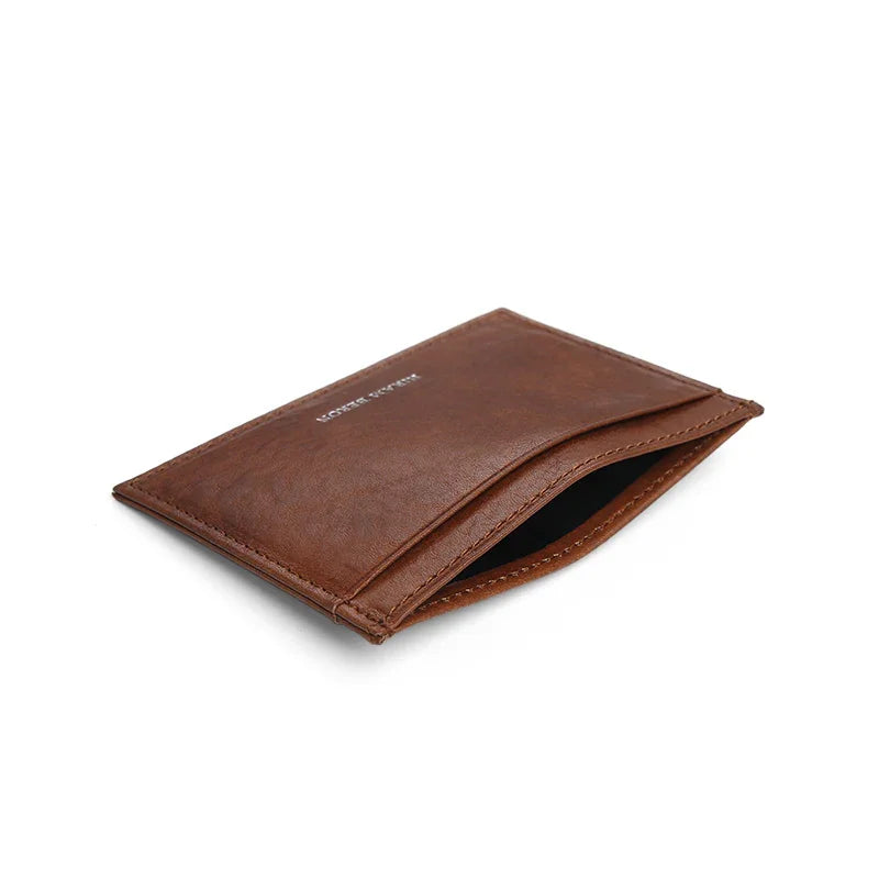 the detail of top pocket for the brown card holder