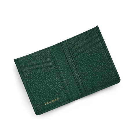 Green pebble slim leather wallet with brand name on a white background