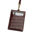 burgundy crocodile pattern ID badge holder with a strap on a white background