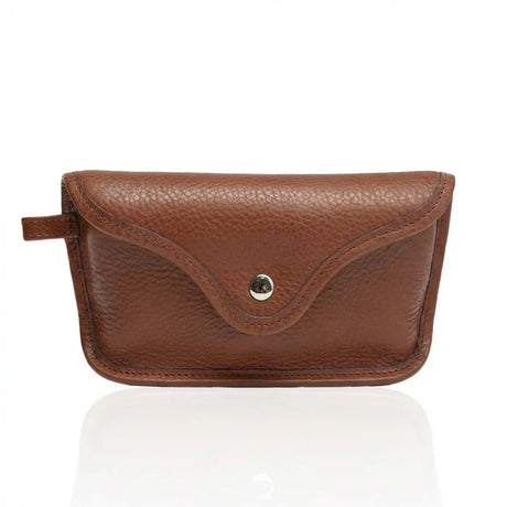 Brown vegetable tanned leather sunglasses pouch with a metallic button on a white background