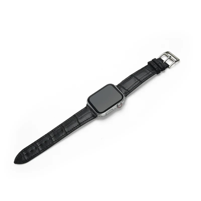 Black smartwatch with a leather strap on a white background