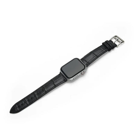 Black smartwatch with a leather strap on a white background