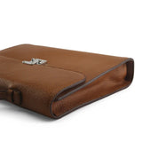 close-up of the painting oil edge of the brown leather tablet briefcases