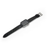 Black aligator watch strap on a white background