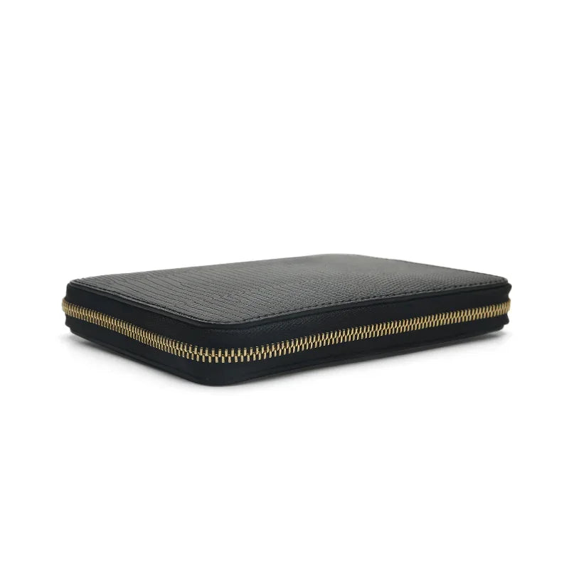 close-up of the gold zipper for the black leather passport wallet