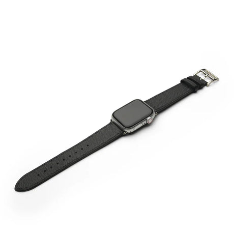 Black epsom leather watch strap with silver clasp on a white background