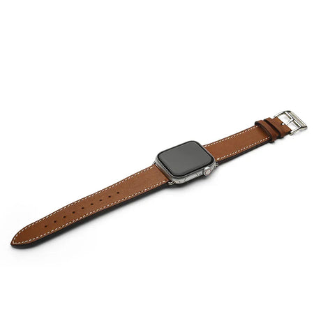 Smartwatch with a brown leather strap on a white background