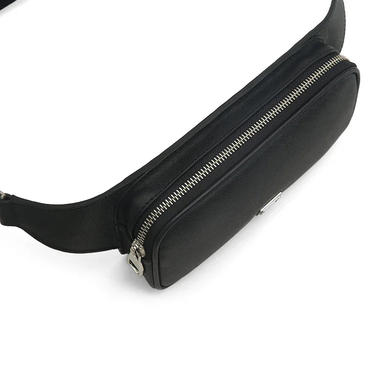 Black saffiano betl bag with a zipper on a white background