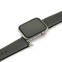 Smartwatch with a black leather strap on a white background