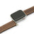 Smartwatch with a vintage brown leather strap on a white background