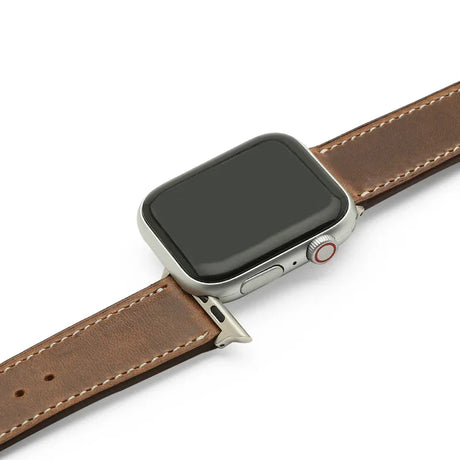 Smartwatch with a vintage brown leather strap on a white background
