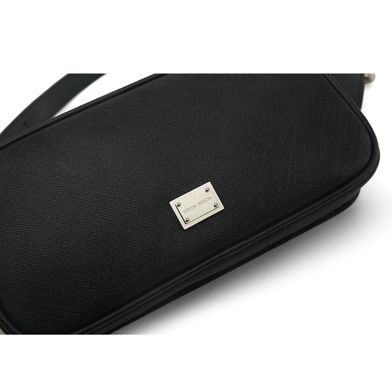 Black saffiano Belt bag with a visible brand logo on a white background