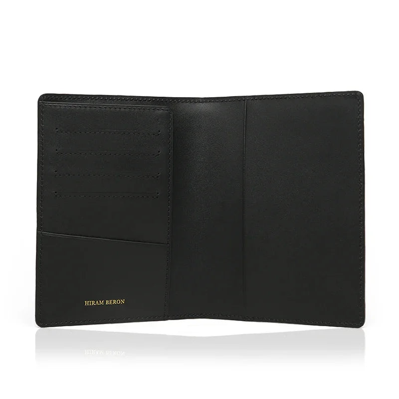 interior viewshowing leather passport with 'Hiram Beron' branding on a white background