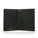 interior viewshowing leather passport with 'Hiram Beron' branding on a white background