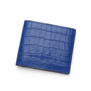 Blue aligator-patterned wallet on a white background