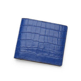 Blue aligator-patterned wallet on a white background