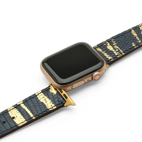 Smartwatch with a blue and gold lizard skin watch strap on a white background