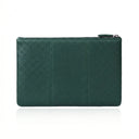 Emerald green pebbled leather clutch with zipper closure, minimalist design for everyday use