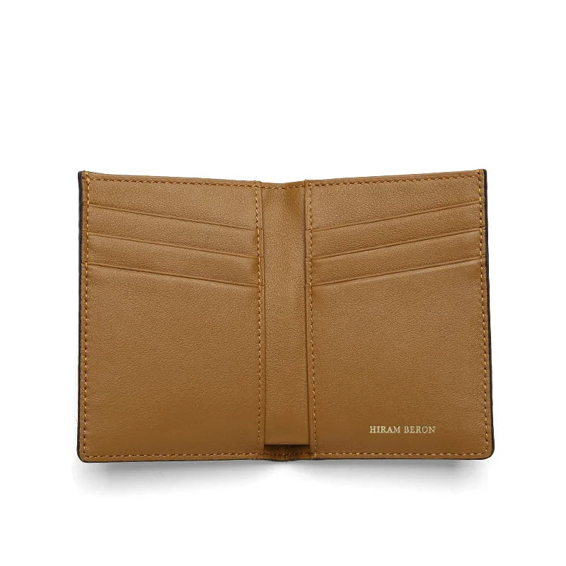 Tan leather wallet with 'Hiram Beron' branding on a white background