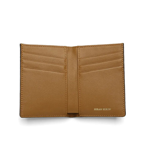 Tan leather wallet with 'Hiram Beron' branding on a white background