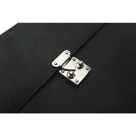 Close-up of a black bag with a silver clasp on a white background