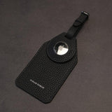 Black pebble leather airtag luggage tag on a gray background