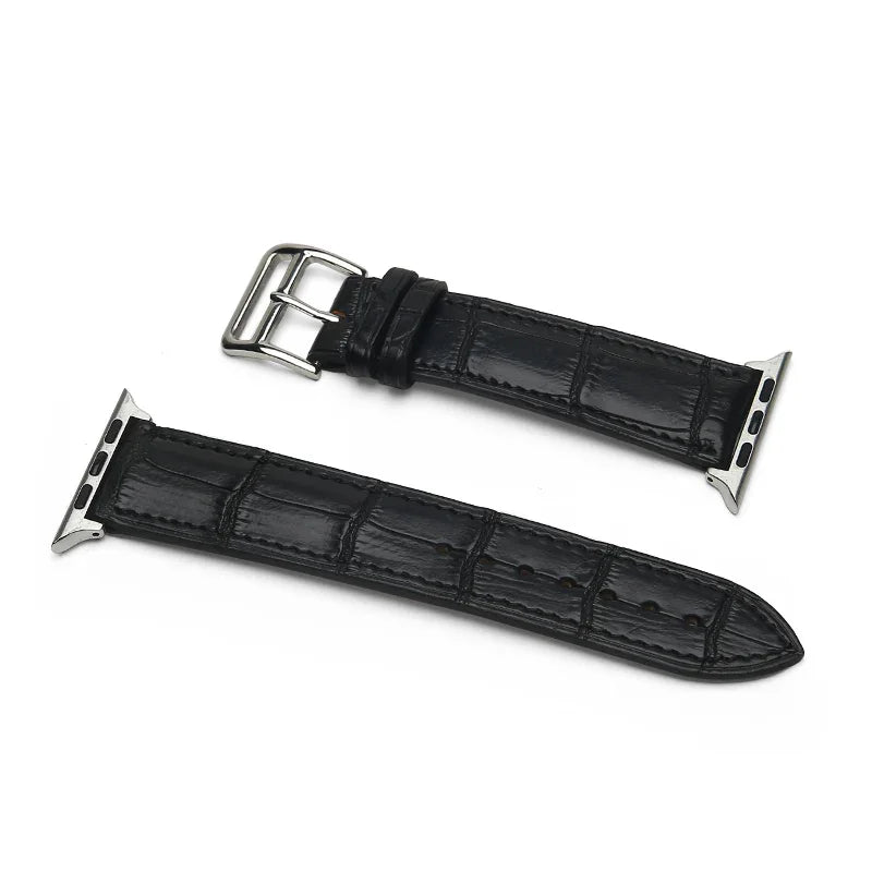 Black aligator leather watch strap with silver buckle on a white background
