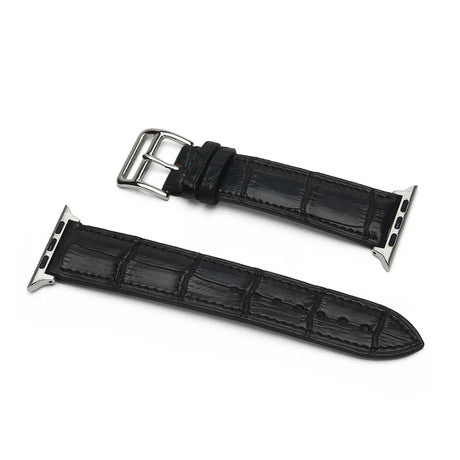 Black aligator leather watch strap with silver buckle on a white background