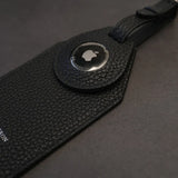 the close-up of the airtag slot for the luggage tag