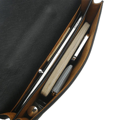 Close-up of the inside look for the black leather folio briefcases.