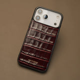 iPhone case with burgundy Italian crocodile pattern on a beige background