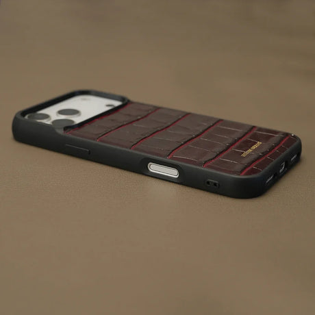Close-up of edge of burngundy iphone 17 pro case