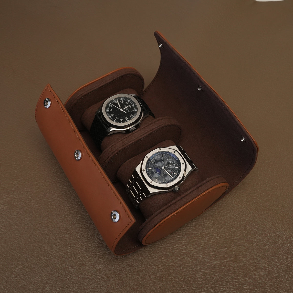Open 2-slot leather watch roll with Patek Philippe and Audemars Piguet watches inside, coffee microfiber lining