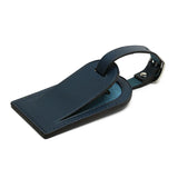 navy blue leather luggage tag with white background