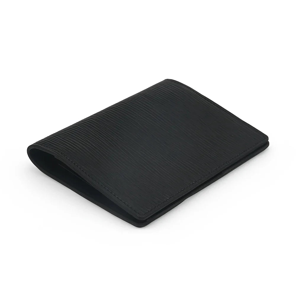 Black textured passport holder on a white background