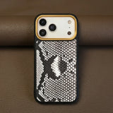 Phone case with genuine python skin on a brown background