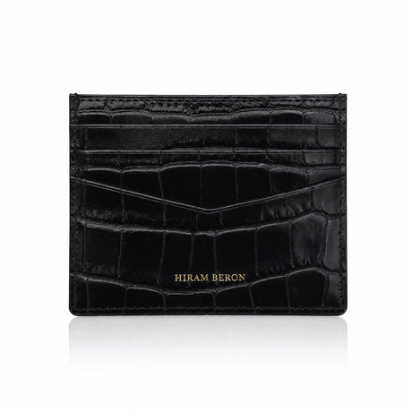 Black crocodile-patterned cardholder with 'Hiram Beron' branding on a white background