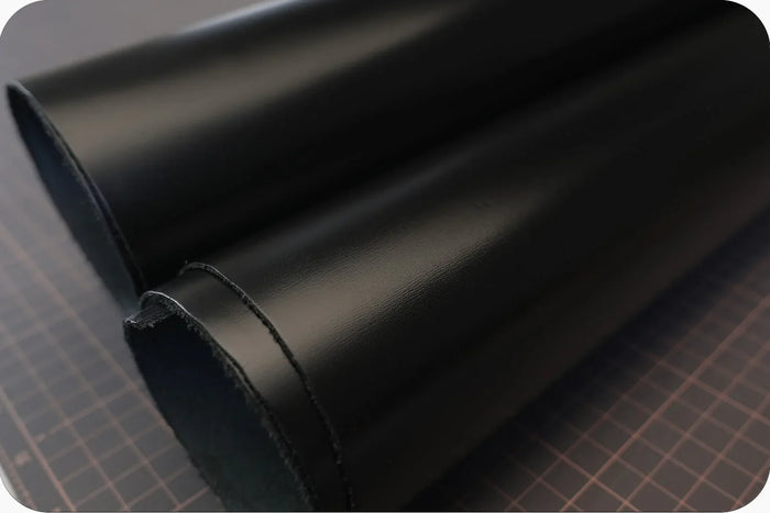 Premium Italian box leather.It features an incredibly tight grain and a 'glassy' appearance,ideal for premier choice for formal luxury accessories. - Hiram Beron Boutique Leather Goods Factory.