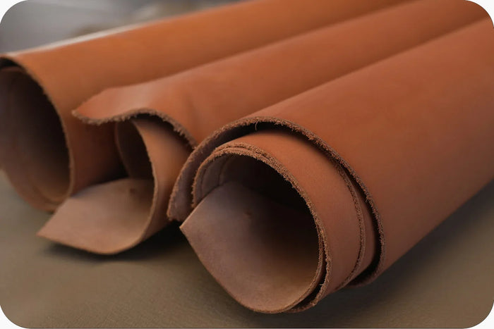 Premium high-fashion calfskin from Italy with an exceptionally smooth and flat surface. It offer a silky touch, perfect for minimalist business clutches and modern luxury bags - Hiram Beron Boutique Leather Sourcing.
