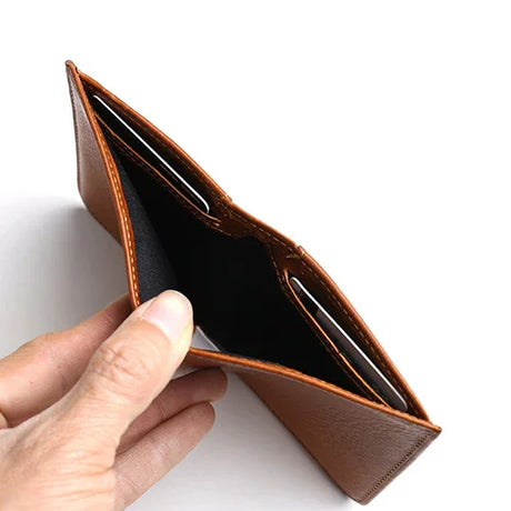 close-up of the hidden pocket for the brown wallet
